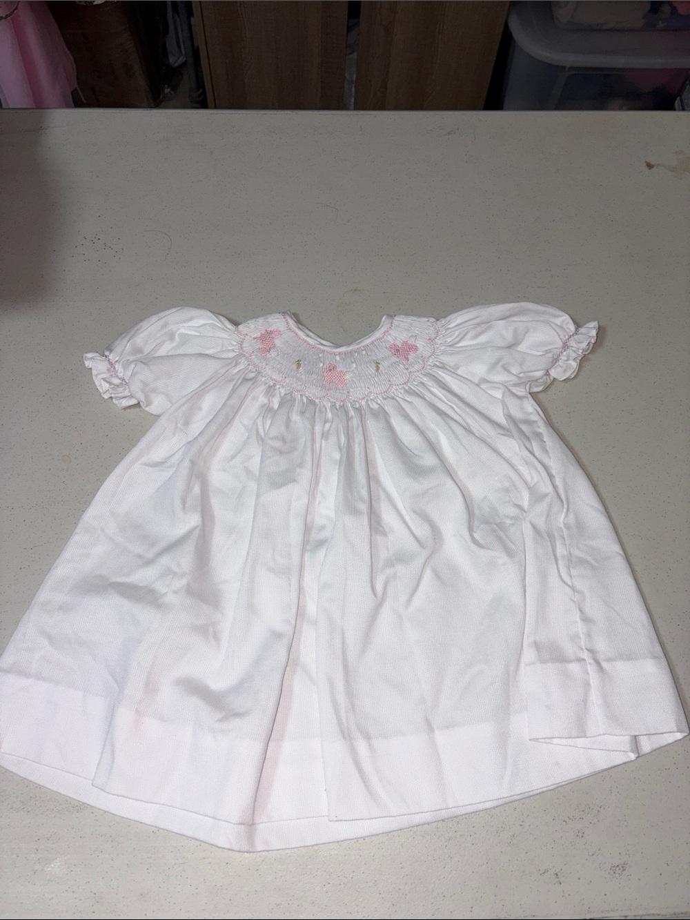 Petit Ami White Smocked Dress with Pink Floral Accents
